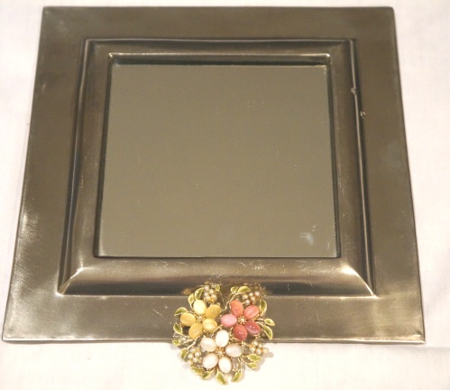 Jewelry embellished mirrors